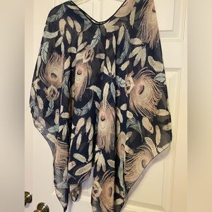 Sheer Pancho. Navy background with teal, peach and tan